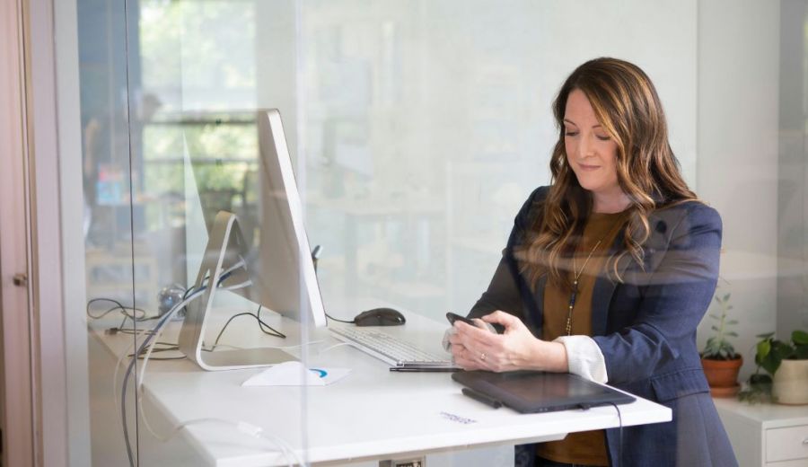 image of a strata manager using a mobile device