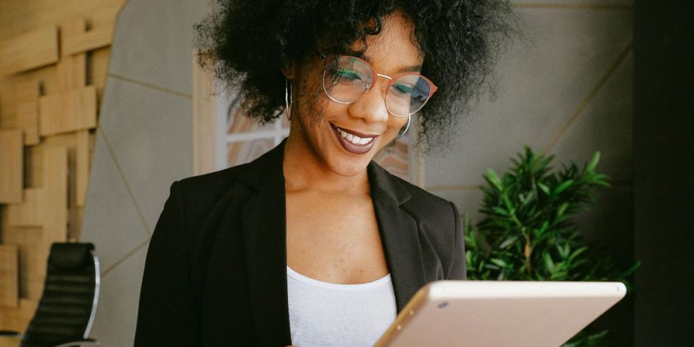 image of a concierge staff member using a tablet device