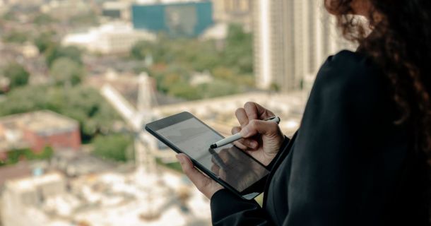 image of building manager using an ipad device