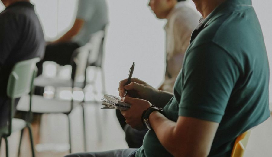 image of a strata committee member in a meeting