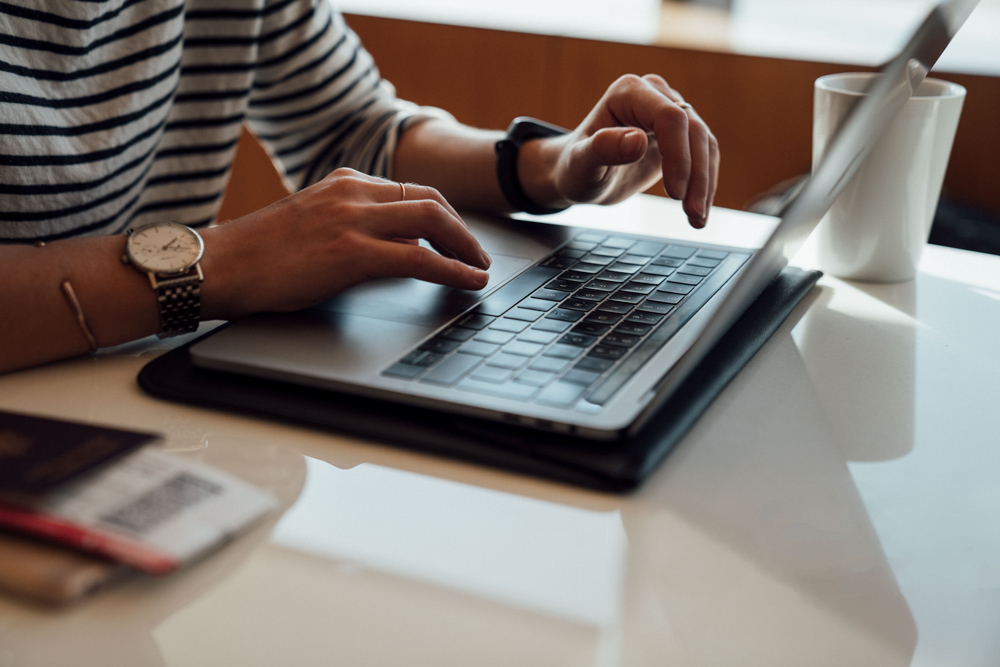 Hands at laptop